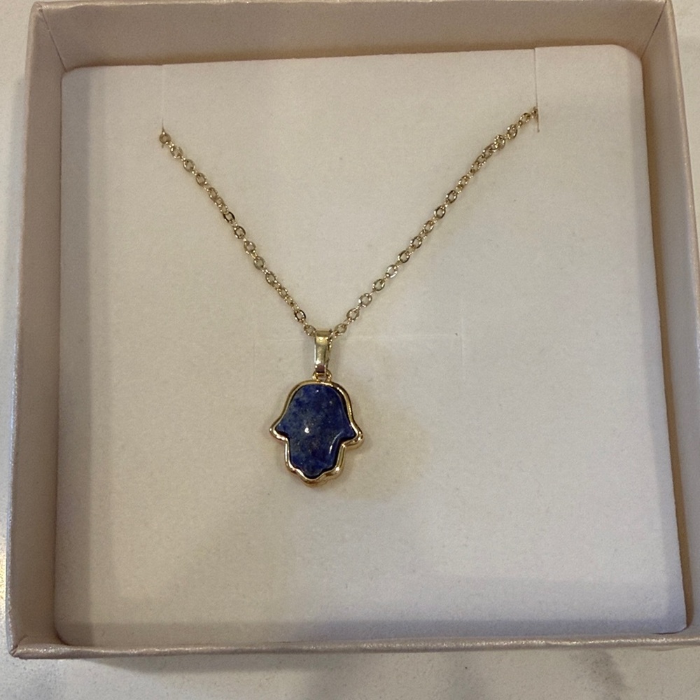 Elegant Gold Necklace with Blue Hamsa Pendant